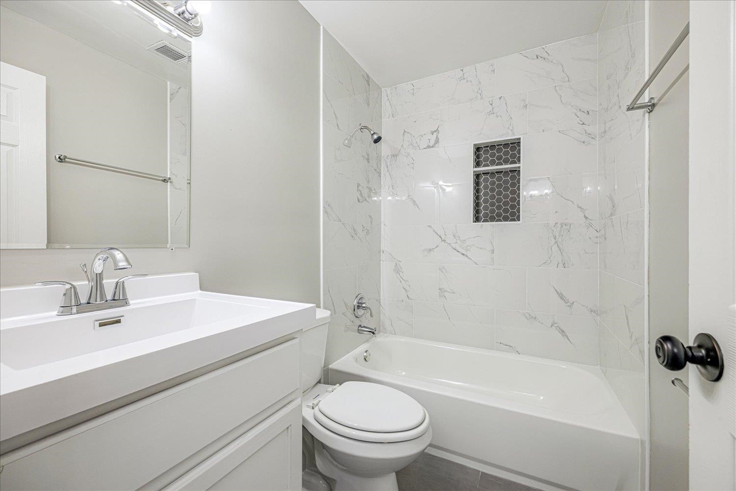 179 Harris Cove Collierville, TN 38017 - Photo 15 of 25 Full bath with shower / tub combination and vanity