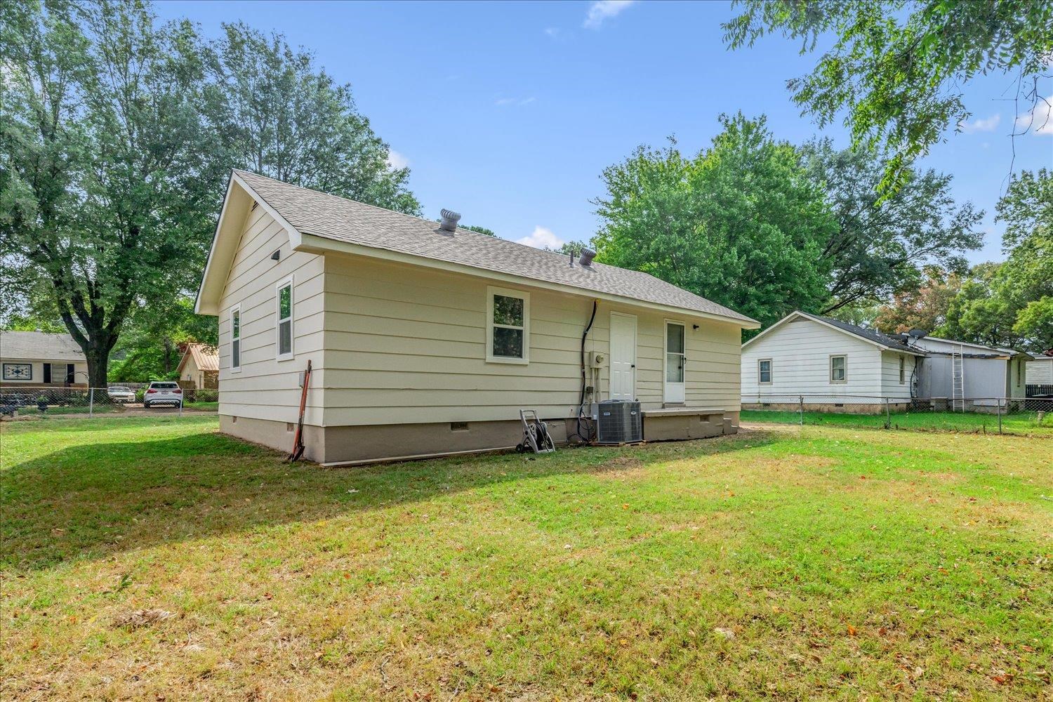 179 Harris Cove Collierville, TN 38017 - Photo 22 of 25 Back of house with crawl space and a shingled roof