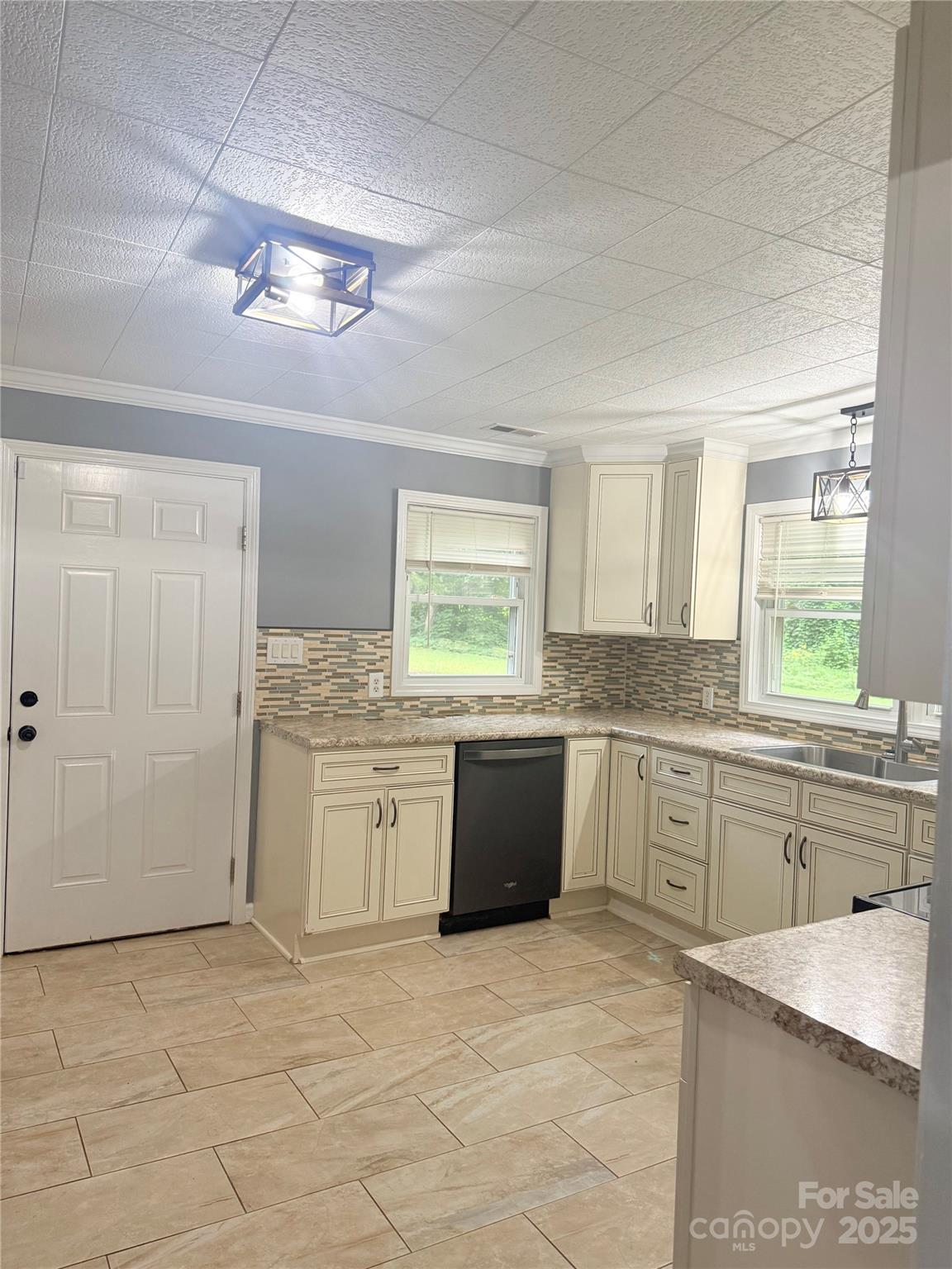 1180 Piney Ridge Road Forest City, NC 28043 - Photo 18 of 35 a large kitchen with a stove a sink dishwasher and a refrigerator