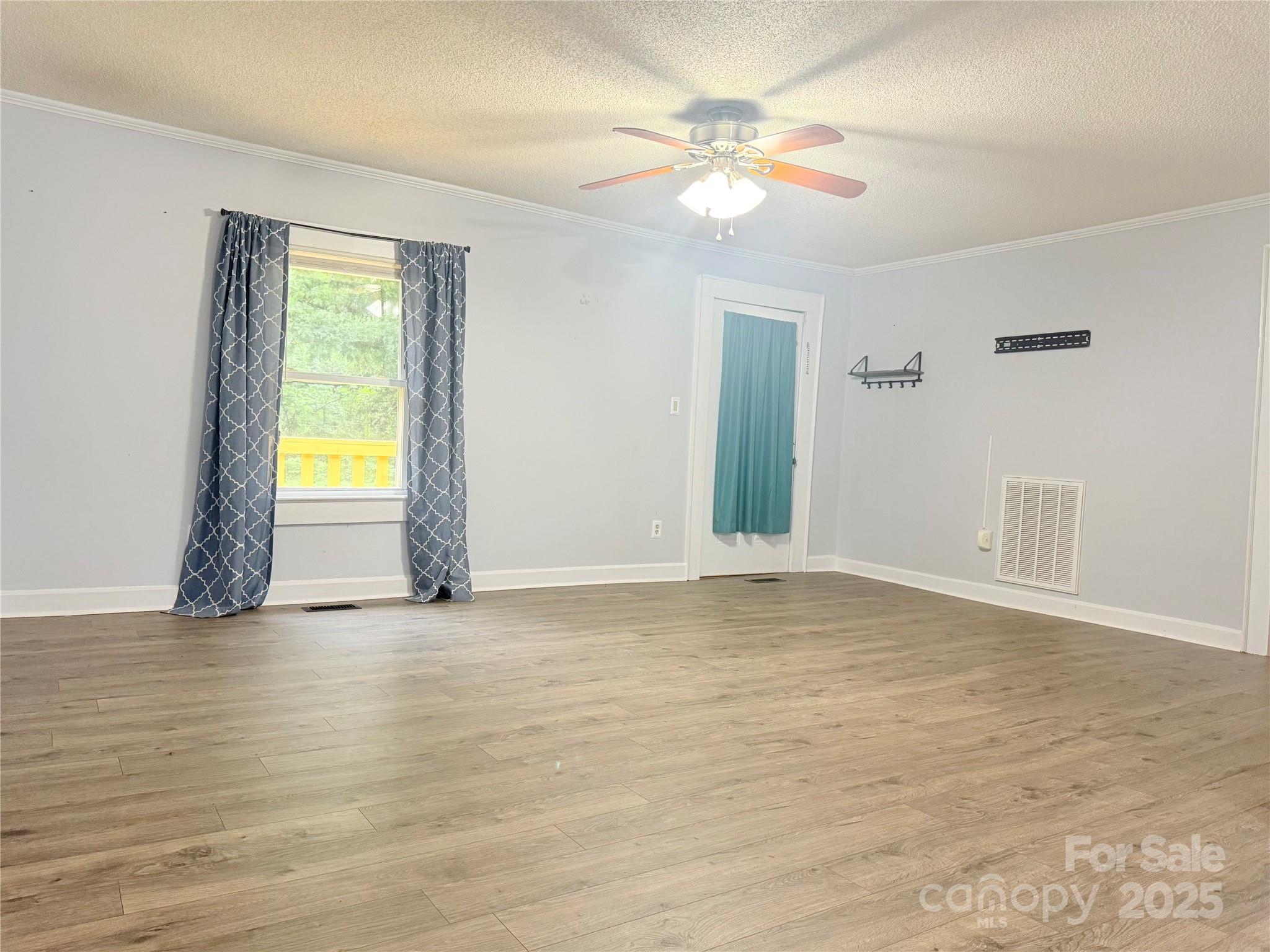 1180 Piney Ridge Road Forest City, NC 28043 - Photo 20 of 35 a view of an empty room with window