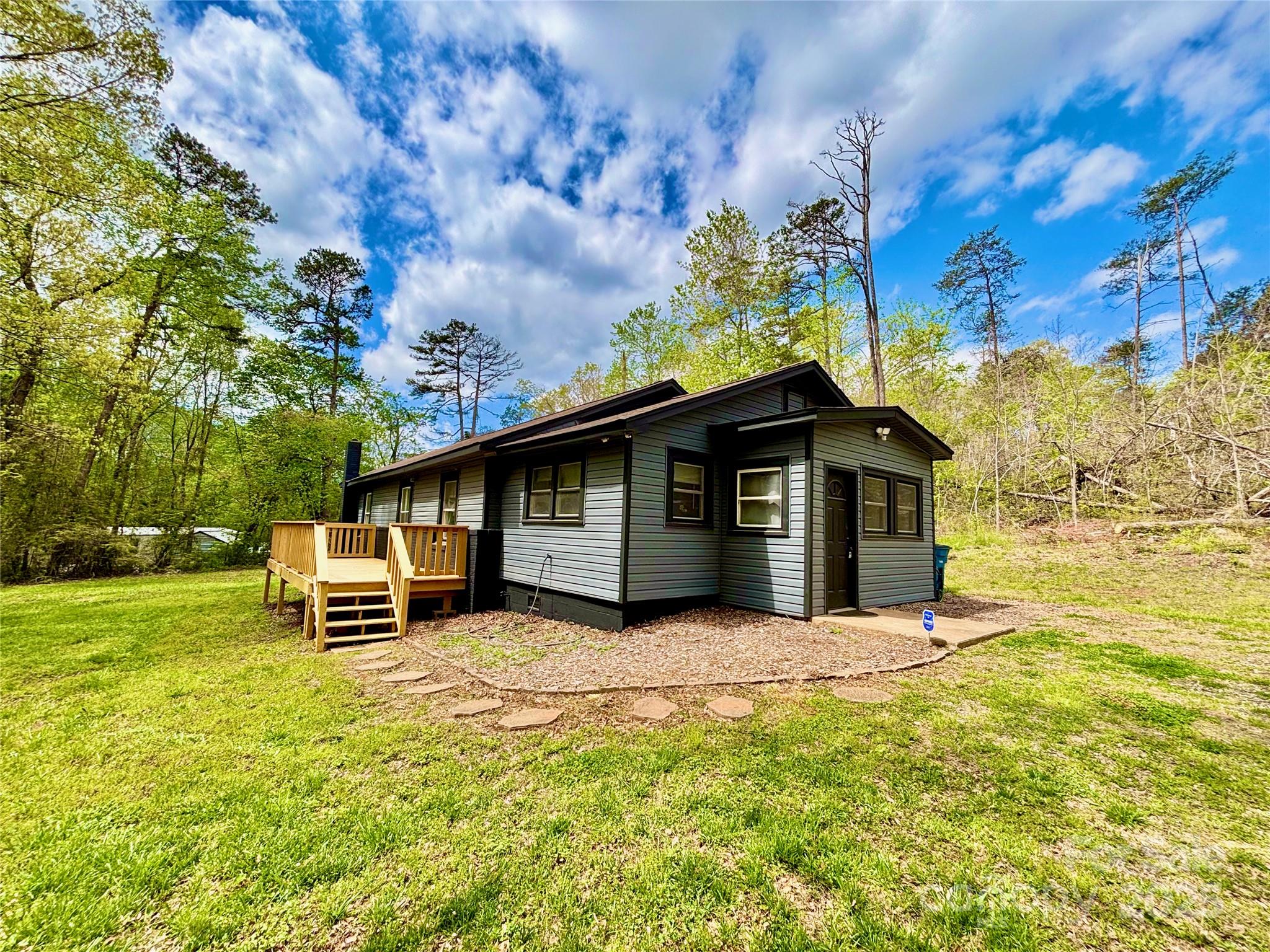 1180 Piney Ridge Road Forest City, NC 28043 - Photo 2 of 35 a view of a house with a yard