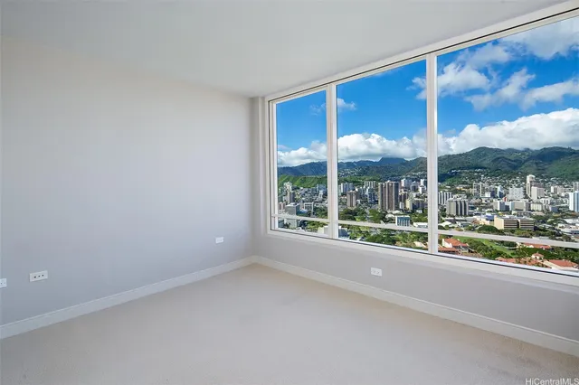 a view of a room with a large window