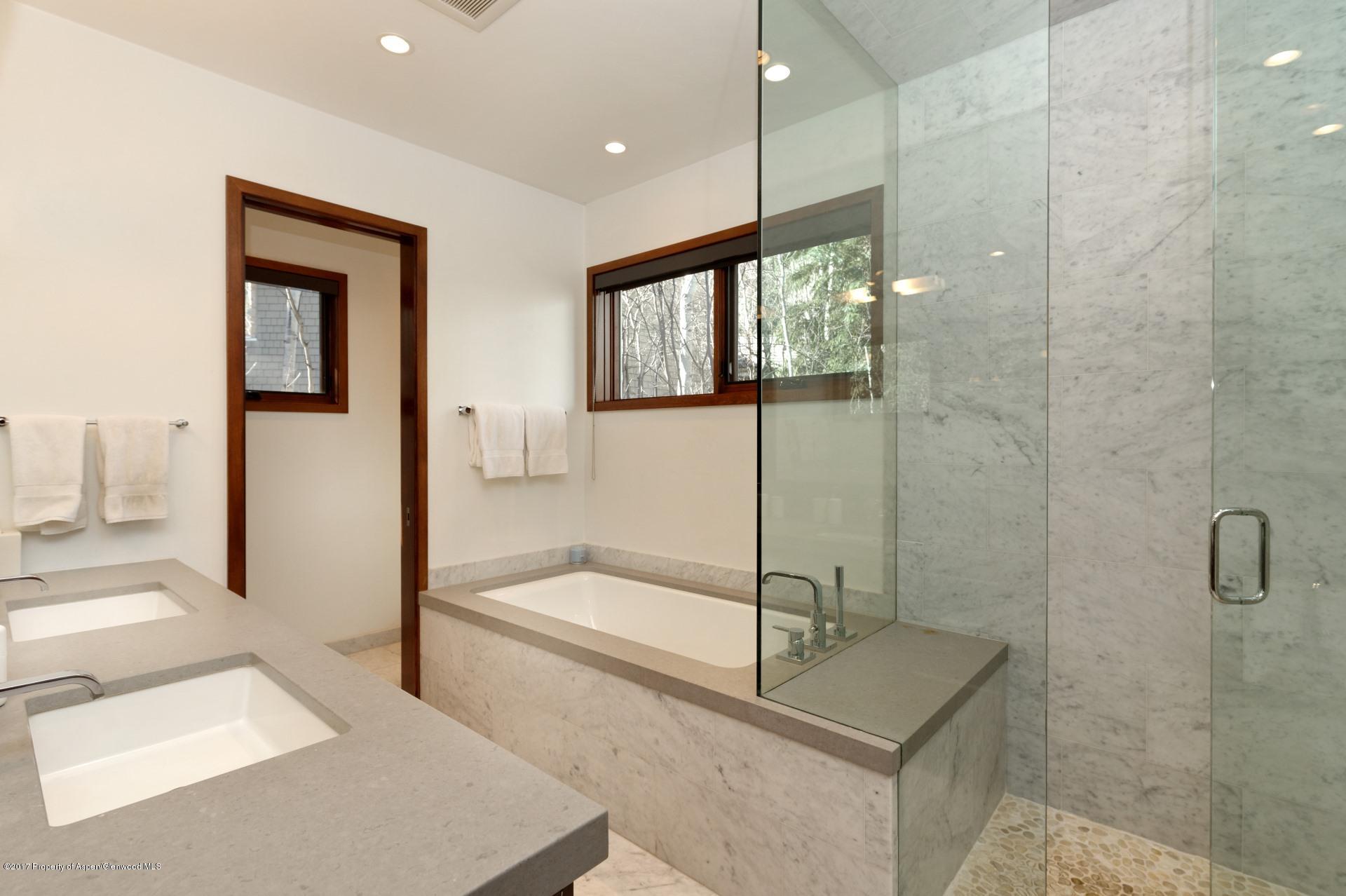 1291 Riverside Drive Aspen, CO 81611 - Photo 10 of 19 a bathroom with a tub and shower
