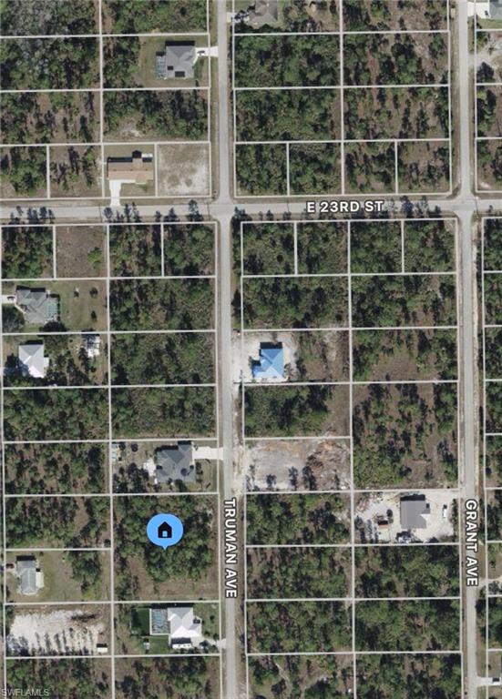 2211 Truman Avenue Alva, FL 33920 - Photo 1 of 1 a view of a glass building with windows