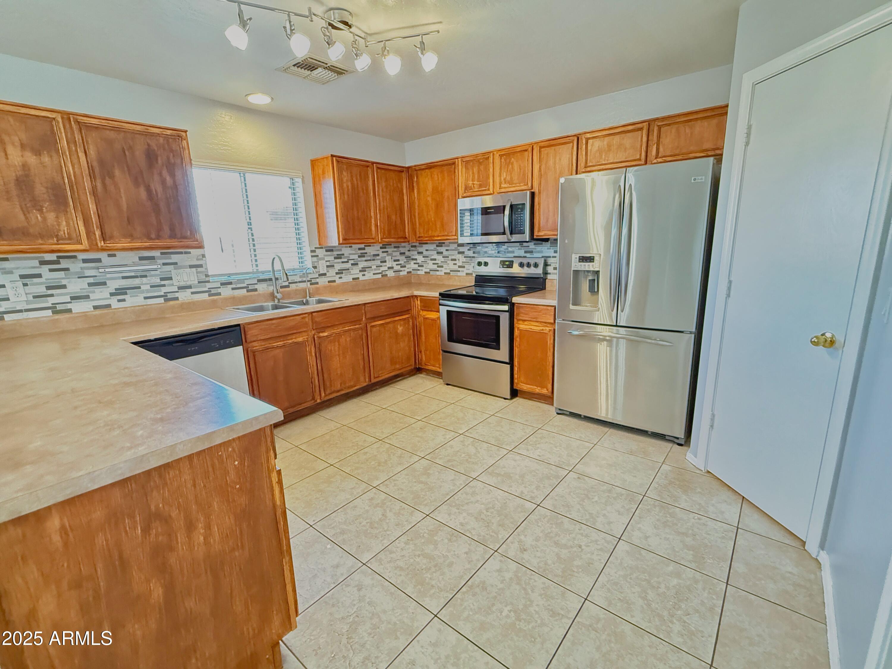 12646 West Willow Avenue El Mirage, AZ 85335 - Photo 8 of 25 IMG_6374