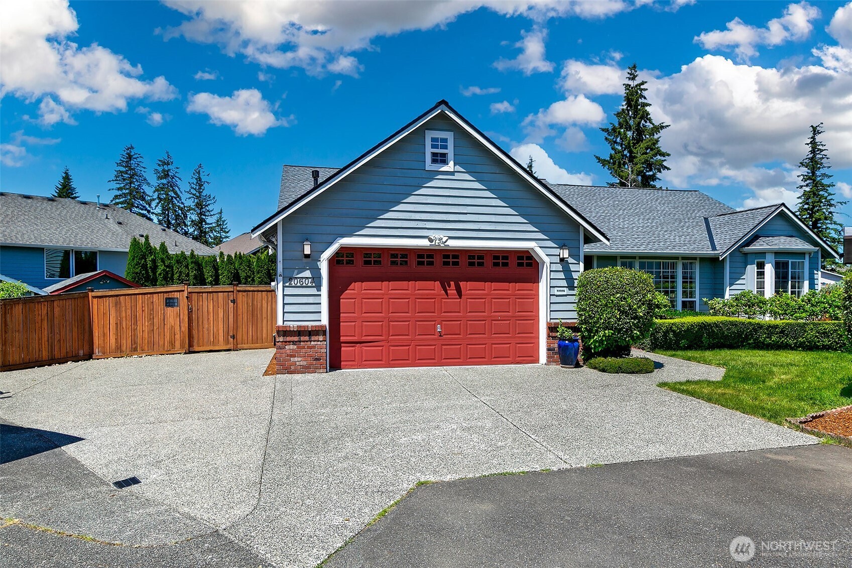 20604 Damson Road Lynnwood, WA 98036 - Photo 24 of 24 a front view of a house with a yard and garage