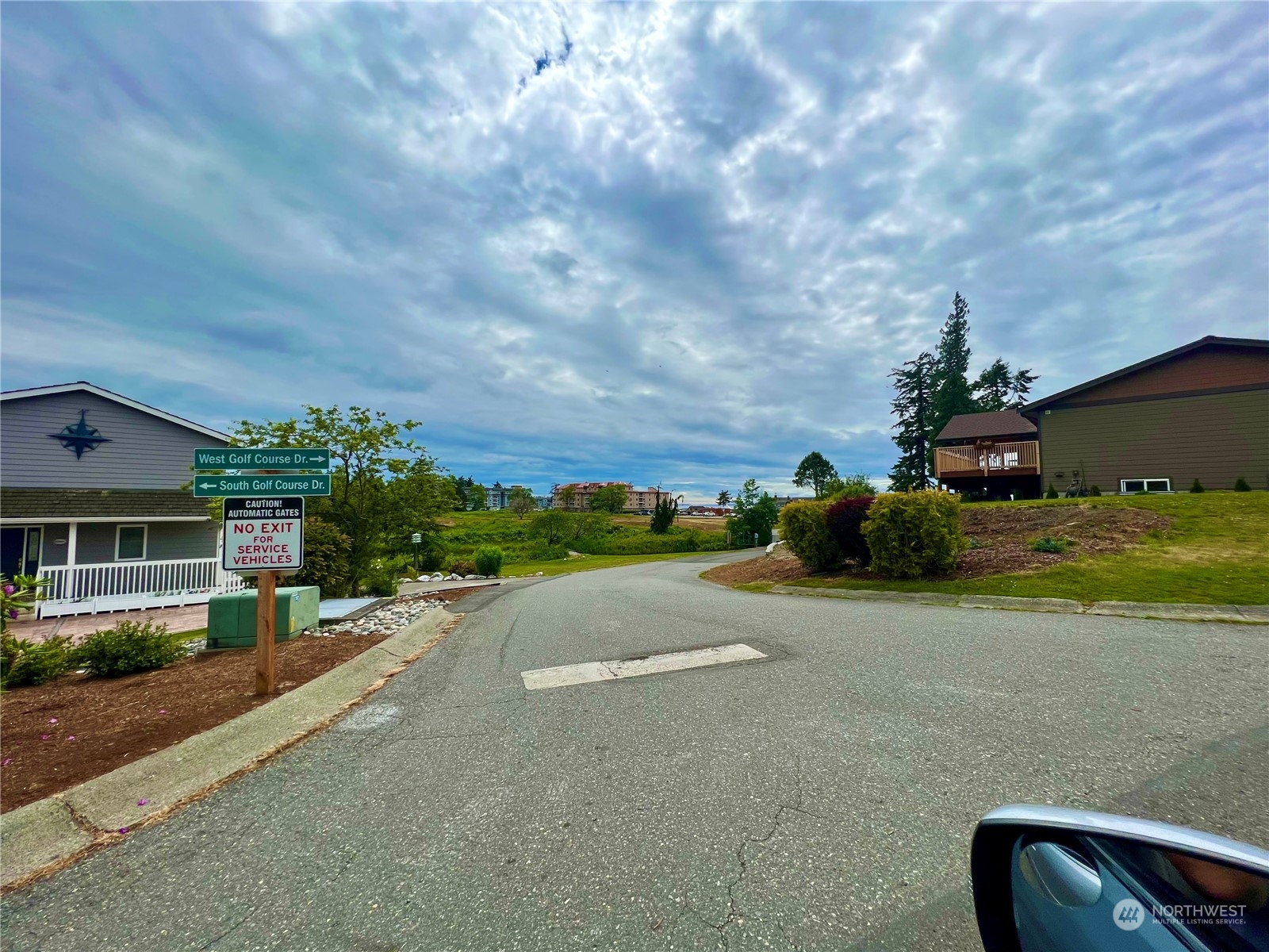 7948 East Golf Course Drive Blaine, WA 98230 - Photo 5 of 11 a view of a street with houses