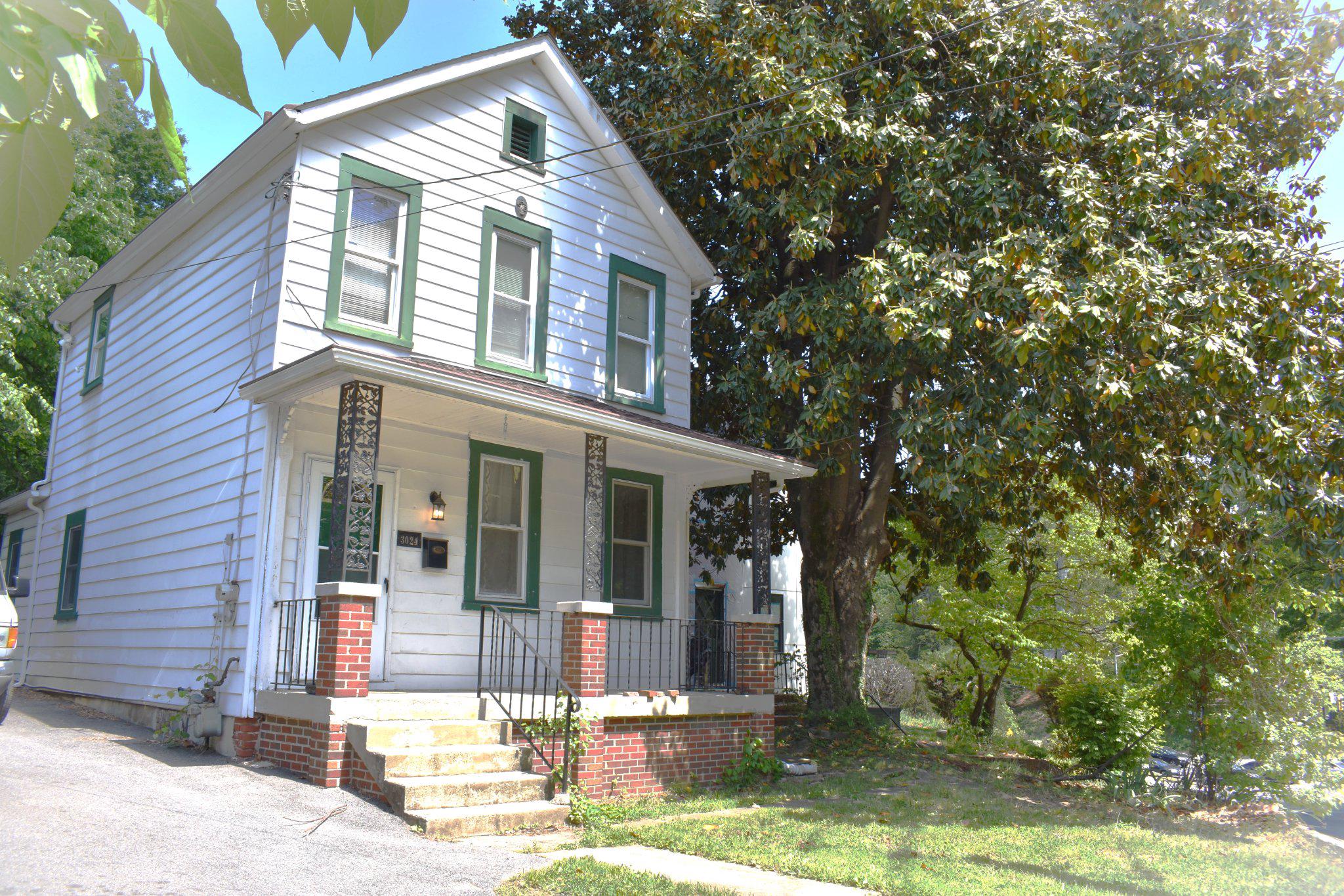 3024 Stanton Road Southeast Washington, DC 20020 - Photo 2 of 13 a front view of a house with garden