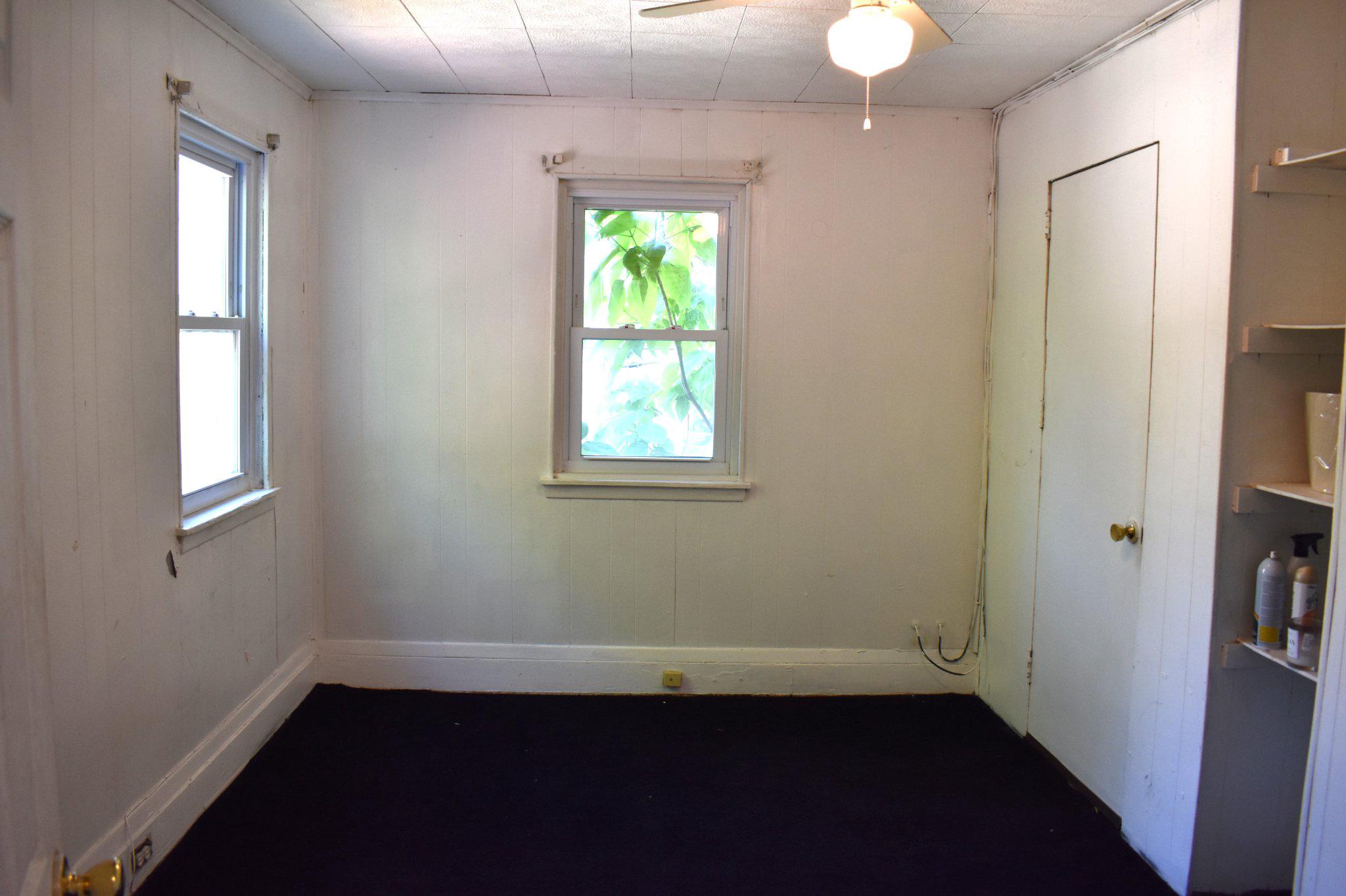 3024 Stanton Road Southeast Washington, DC 20020 - Photo 8 of 13 an empty room with windows and closet