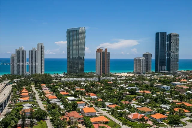 a view of a city with tall buildings