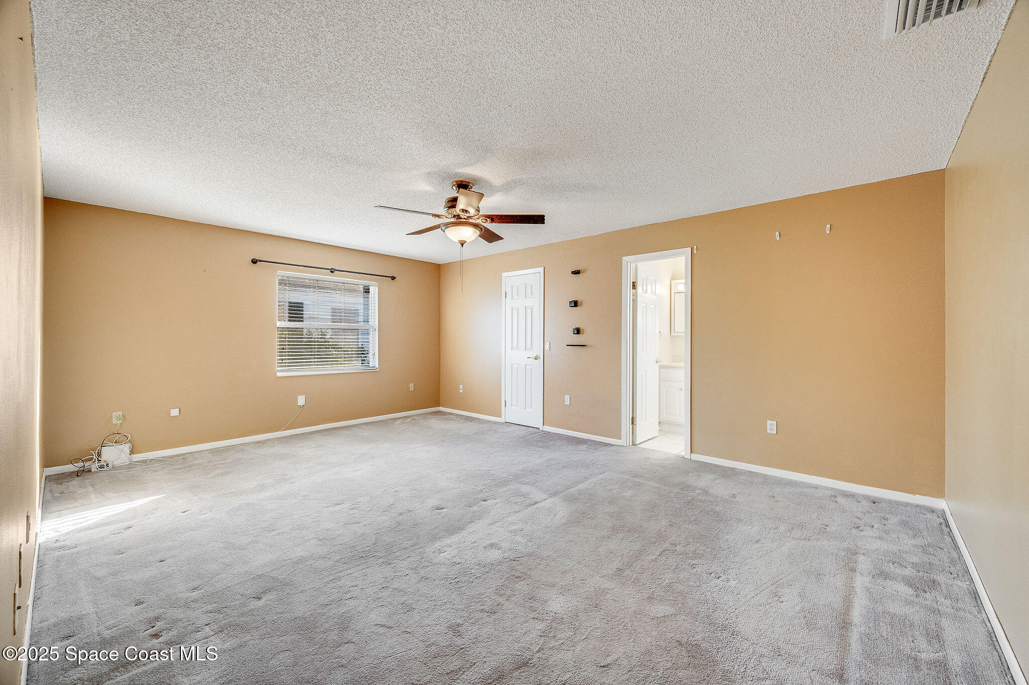 987 Sycamore Drive Rockledge, FL 32955 - Photo 20 of 48 a view of an empty room with a window