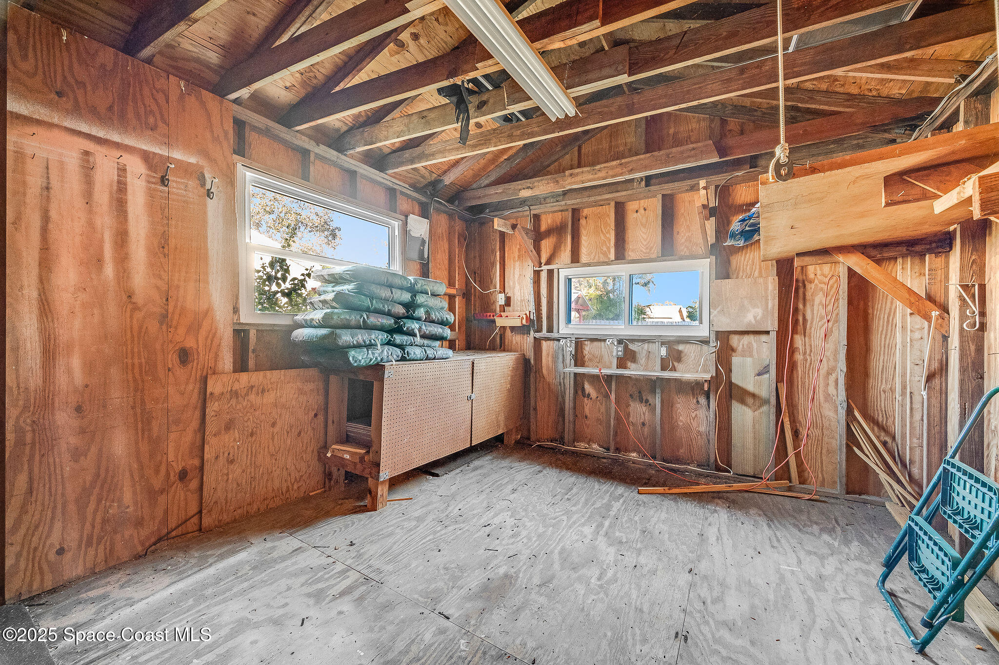 987 Sycamore Drive Rockledge, FL 32955 - Photo 40 of 48 a view of a room with racks on the wall