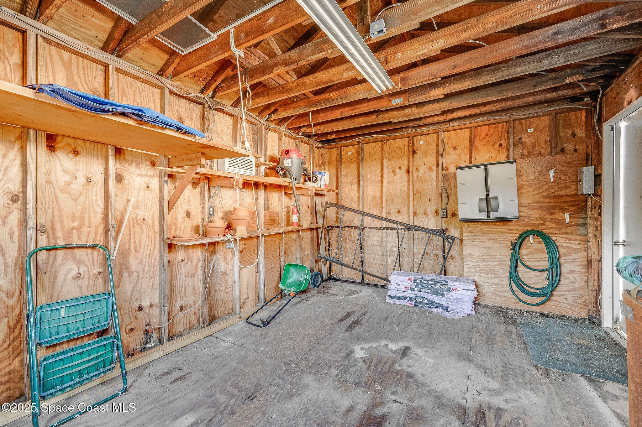 987 Sycamore Drive Rockledge, FL 32955 - Photo 41 of 48 a view of a room with wooden walls