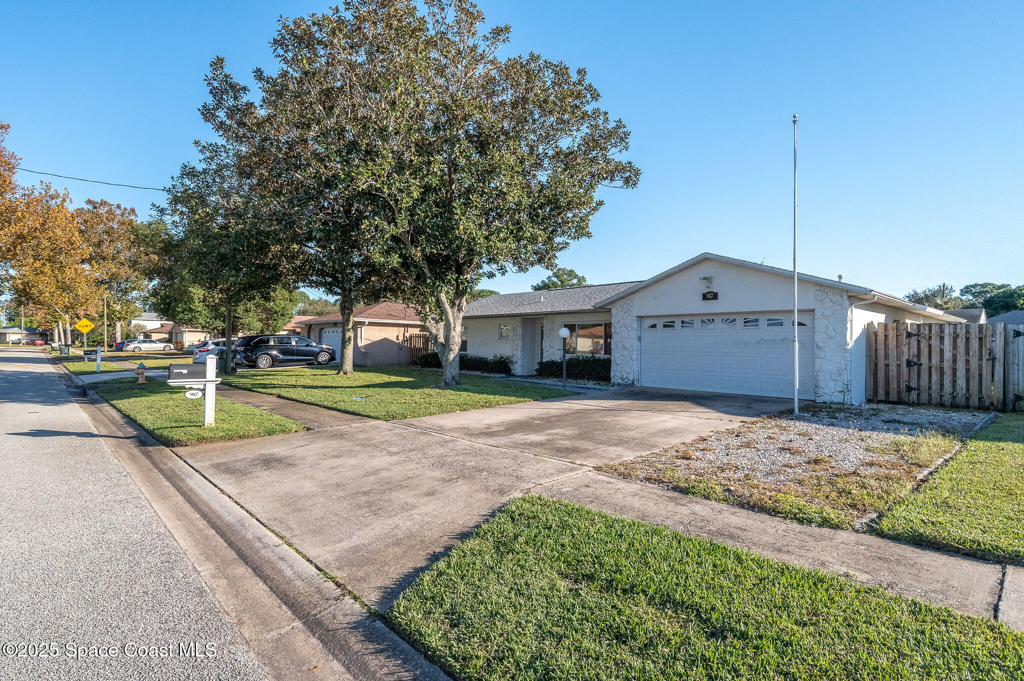 987 Sycamore Drive Rockledge, FL 32955 - Photo 43 of 48 a view of a house with a yard