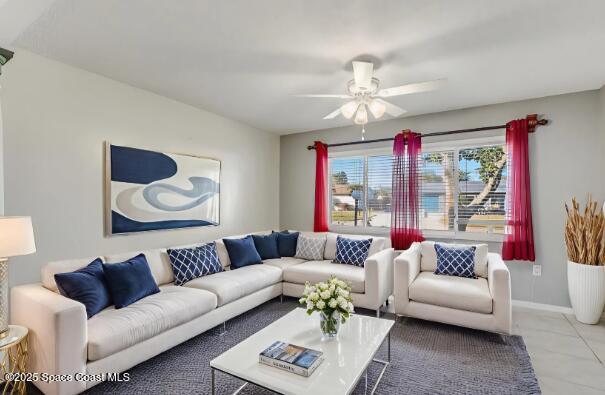 987 Sycamore Drive Rockledge, FL 32955 - Photo 7 of 48 a living room with furniture and a large window