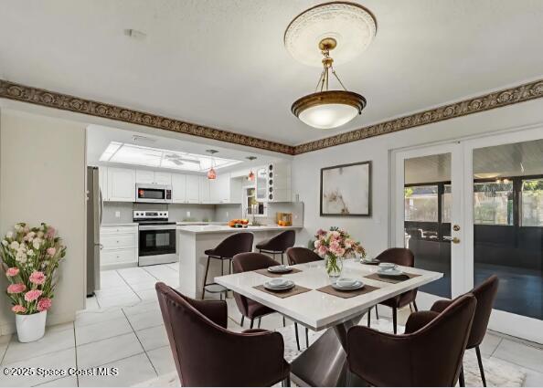 987 Sycamore Drive Rockledge, FL 32955 - Photo 9 of 48 Staged Dining room