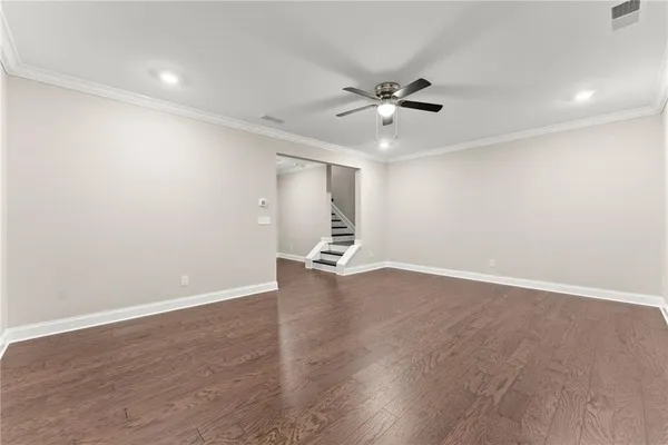 a view of a hallway with windows