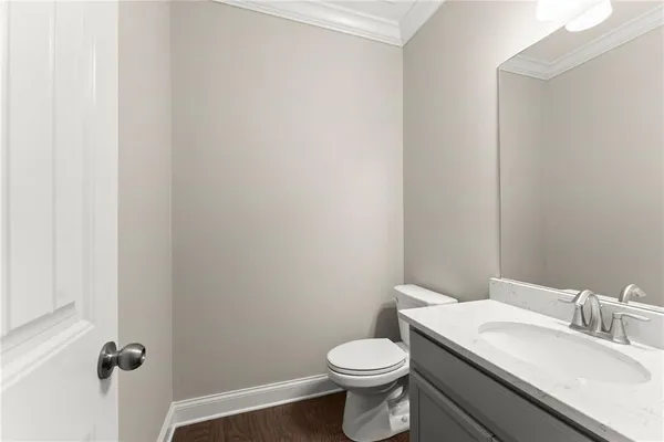 an empty room with a window and a ceiling fan