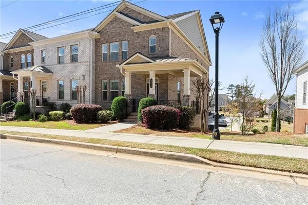 a view of outdoor space with garden and seating area