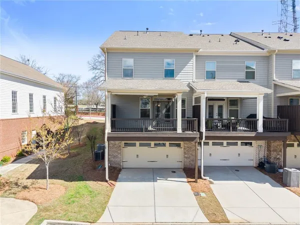 an aerial view of residential building and lake view