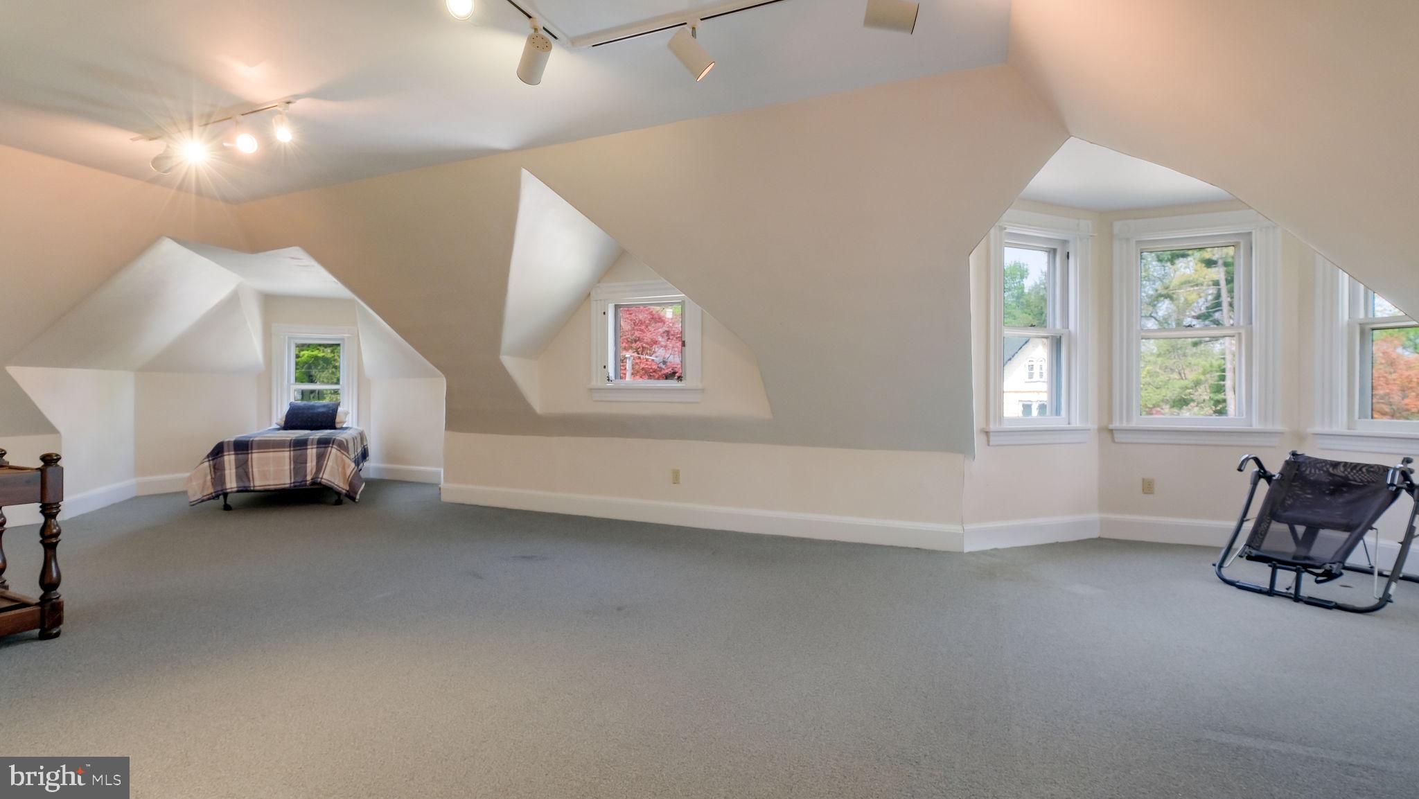 130 Woodland Road Wyncote, PA 19095 - Photo 19 of 37 a view of livingroom with furniture and windows