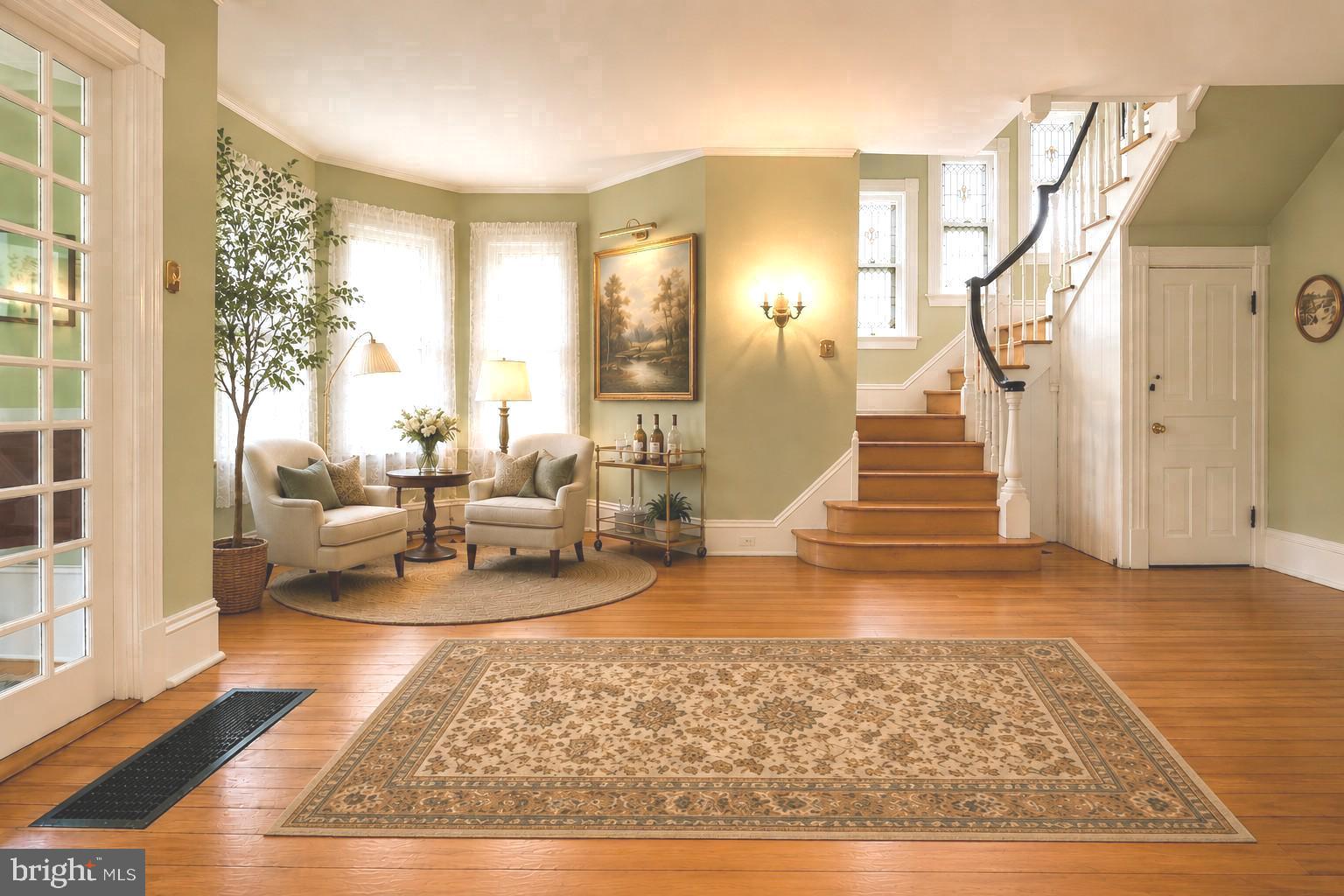 130 Woodland Road Wyncote, PA 19095 - Photo 3 of 37 a living room with furniture and a rug