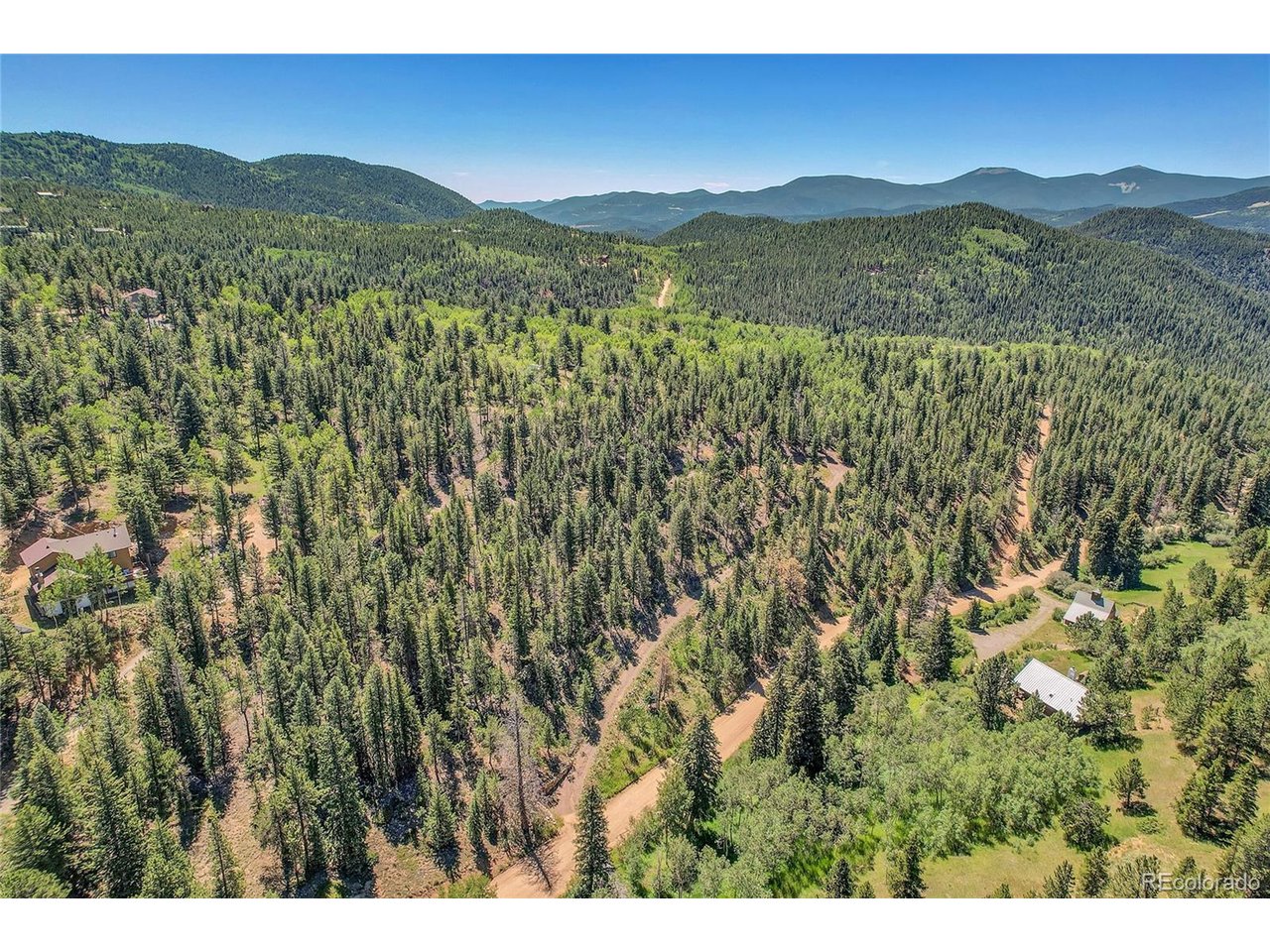 9 Hughesville Road Black Hawk, CO 80422 - Photo 3 of 17 a view of a city with mountain