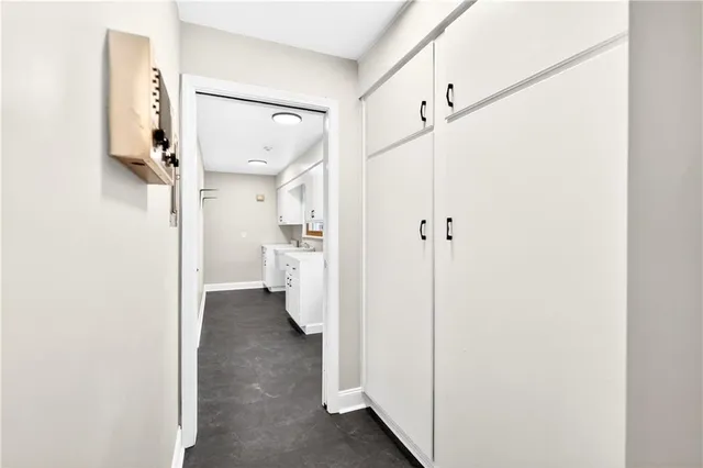 a view of a bathroom with a shower and a sink