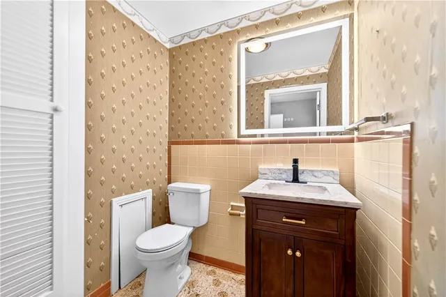a bathroom with a sink and a toilet