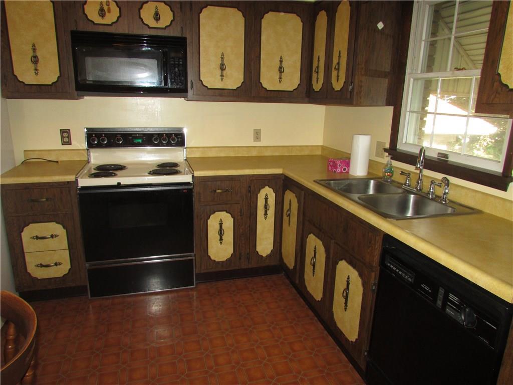 4867 Williamsport Road Elizabeth, PA 15037 - Photo 12 of 25 Kitchen includes dishwasher, microwave oven, refrigerator and electric stove