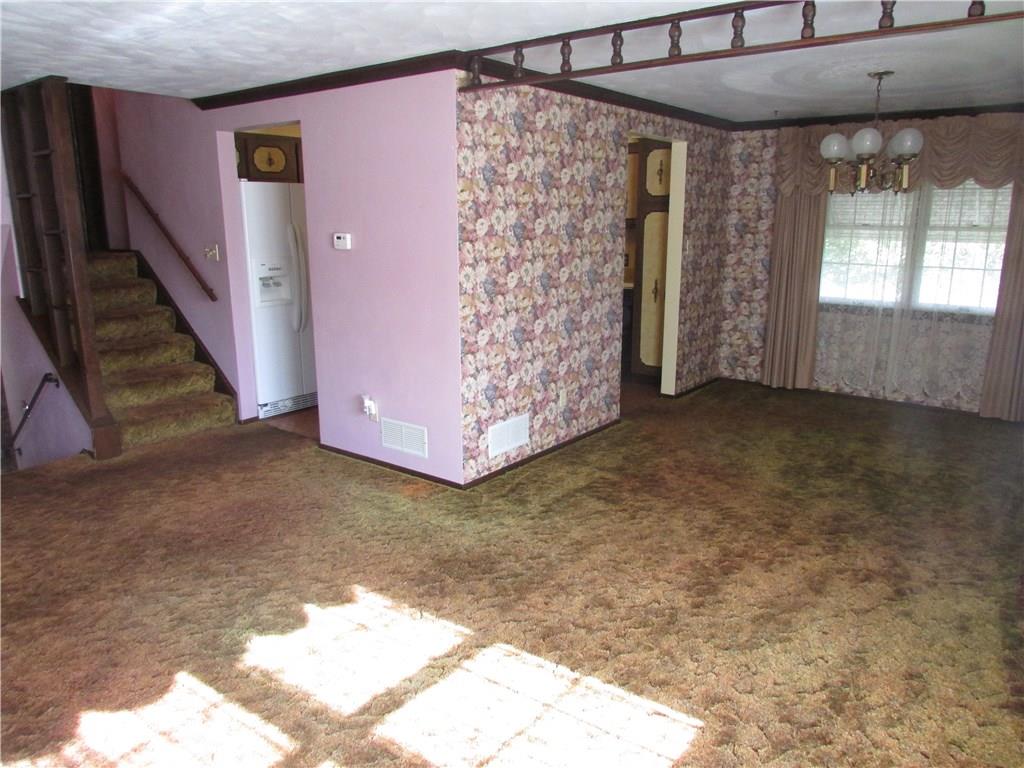 4867 Williamsport Road Elizabeth, PA 15037 - Photo 10 of 25 Living Room open to dining room
