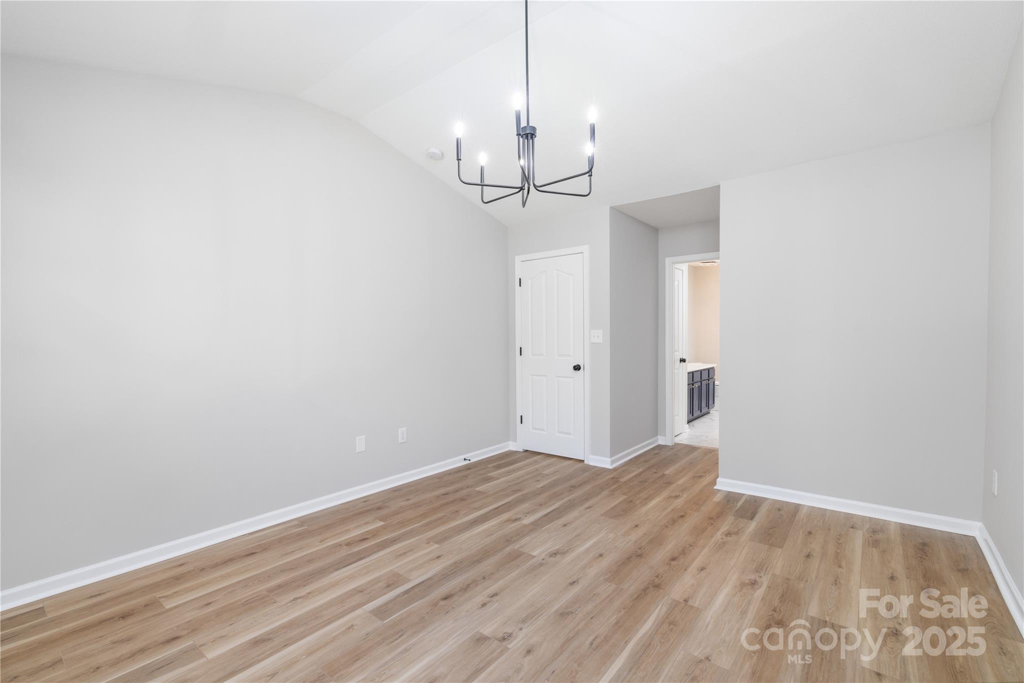 181 Mott Road Mooresville, NC 28115 - Photo 18 of 26 a view of a chandelier in a room