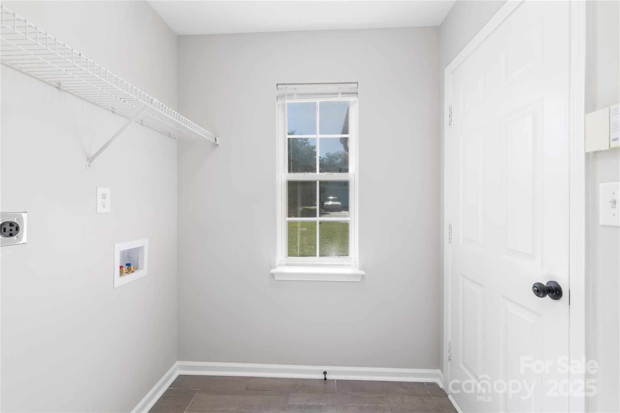 181 Mott Road Mooresville, NC 28115 - Photo 22 of 26 a view of an empty room with a window