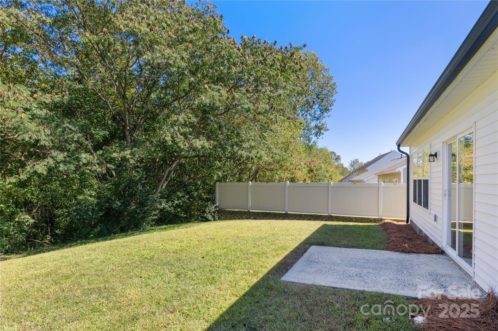 181 Mott Road Mooresville, NC 28115 - Photo 24 of 26 a view of a backyard with a small cabin