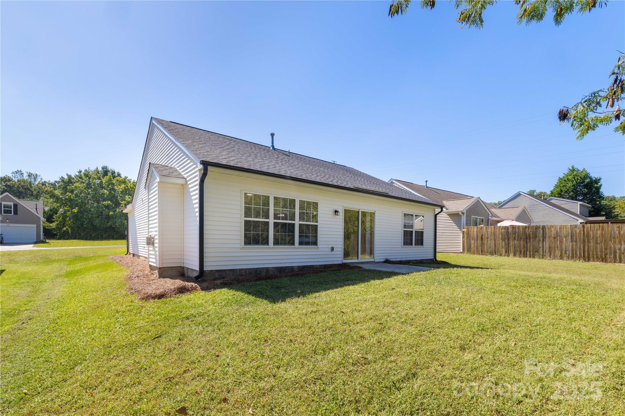 181 Mott Road Mooresville, NC 28115 - Photo 26 of 26 a view of a house with a yard and sitting area