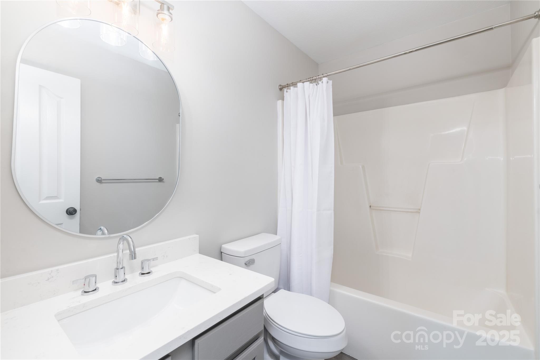 181 Mott Road Mooresville, NC 28115 - Photo 5 of 26 a bathroom with a sink toilet and shower