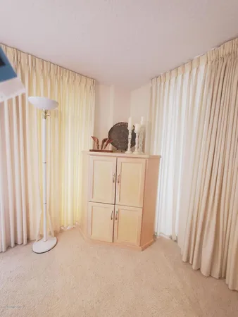 a en suite bathroom with a sink a mirror and a toilet