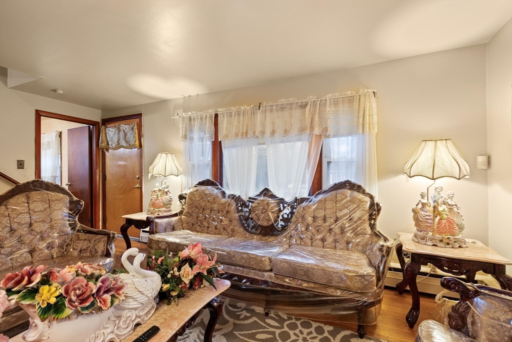 115 Windham Road Boston, MA 02136 - Photo 5 of 30 a living room with furniture and a table