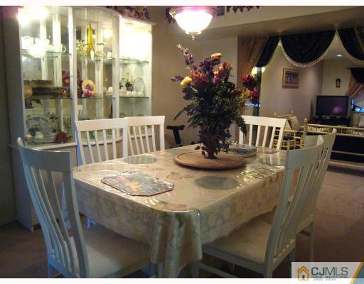 5207 Hana Road Edison, NJ 08817 - Photo 6 of 10 a dining room with furniture and window