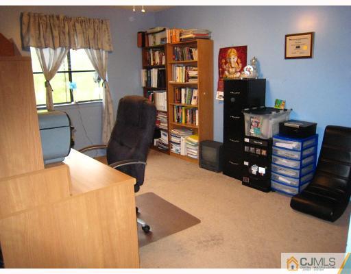5207 Hana Road Edison, NJ 08817 - Photo 9 of 10 a living room with furniture window and flat screen tv