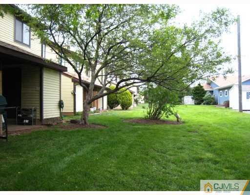 5207 Hana Road Edison, NJ 08817 - Photo 10 of 10 a view of a house with a backyard