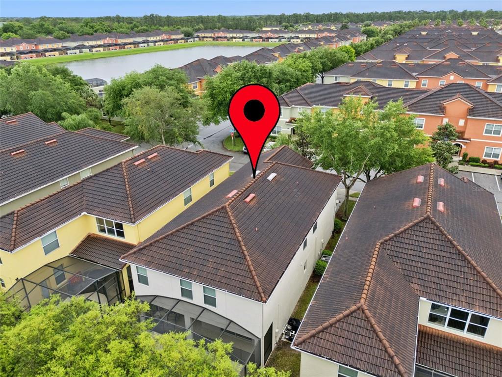 8965 Cuban Palm Road Kissimmee, FL 34747 - Photo 35 of 77 an aerial view of a house with a swimming pool and outdoor space