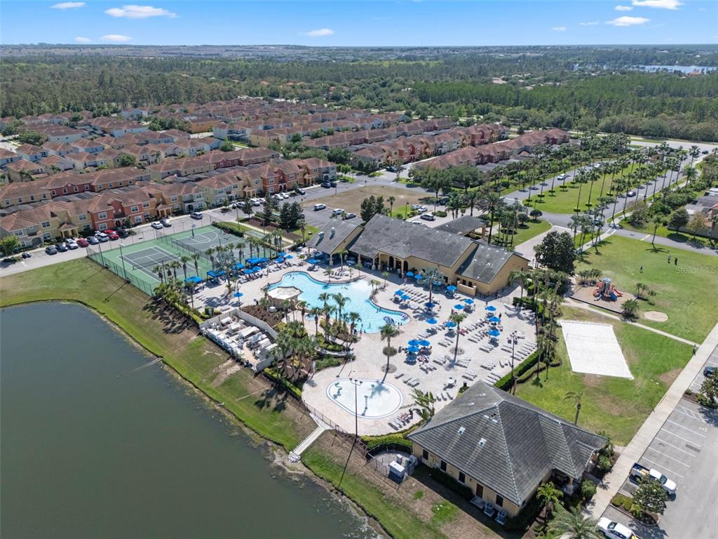 8965 Cuban Palm Road Kissimmee, FL 34747 - Photo 49 of 77 an aerial view of a house with a mountain