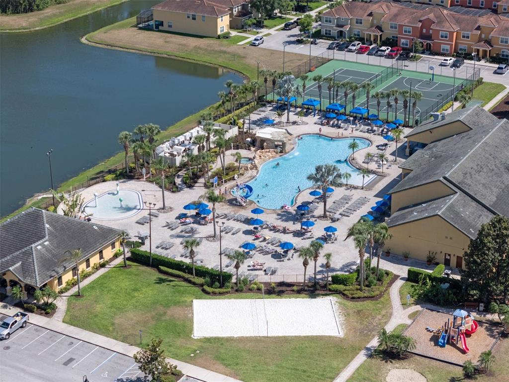 8965 Cuban Palm Road Kissimmee, FL 34747 - Photo 52 of 77 an aerial view of residential houses with outdoor space