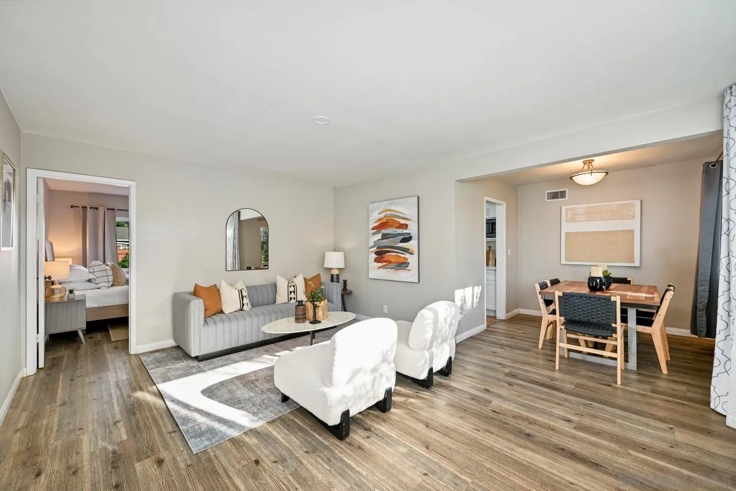 720 Fern Street Escondido, CA 92027 - Photo 4 of 28 a living room with furniture and a wooden floor