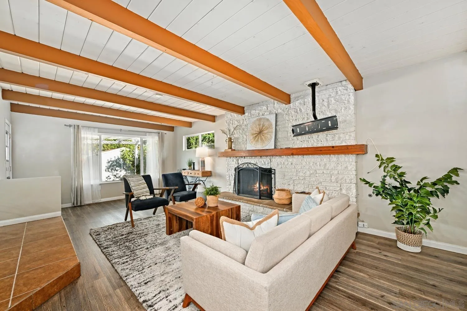 720 Fern Street Escondido, CA 92027 - Photo 8 of 28 a living room with furniture and a fireplace