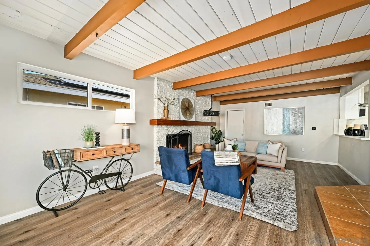 720 Fern Street Escondido, CA 92027 - Photo 10 of 28 a view of a dining room with furniture and wooden floor