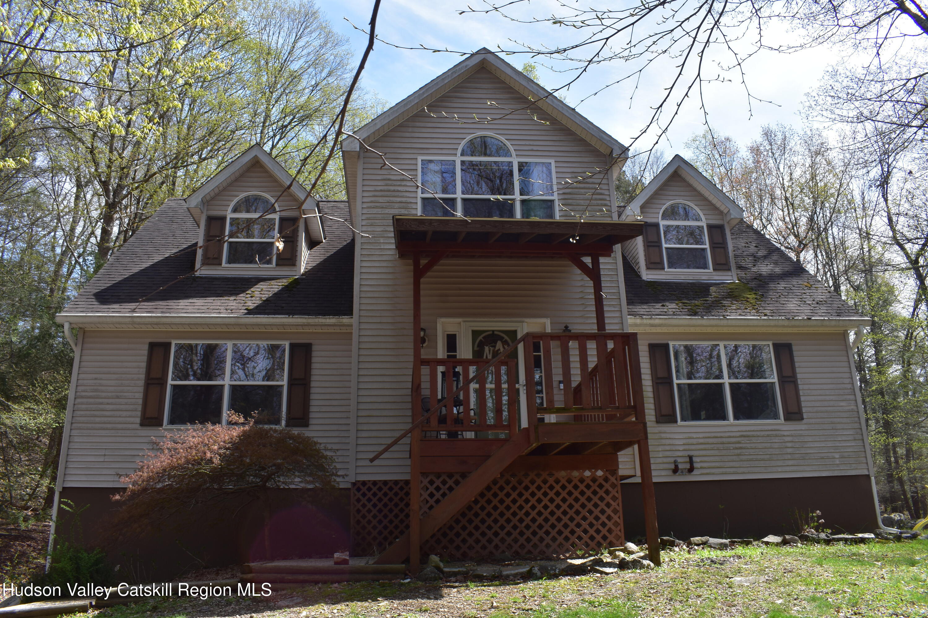 125 Hardenburgh Road Ulster Park, NY 12487 - Photo 1 of 45 a front view of a house with yard