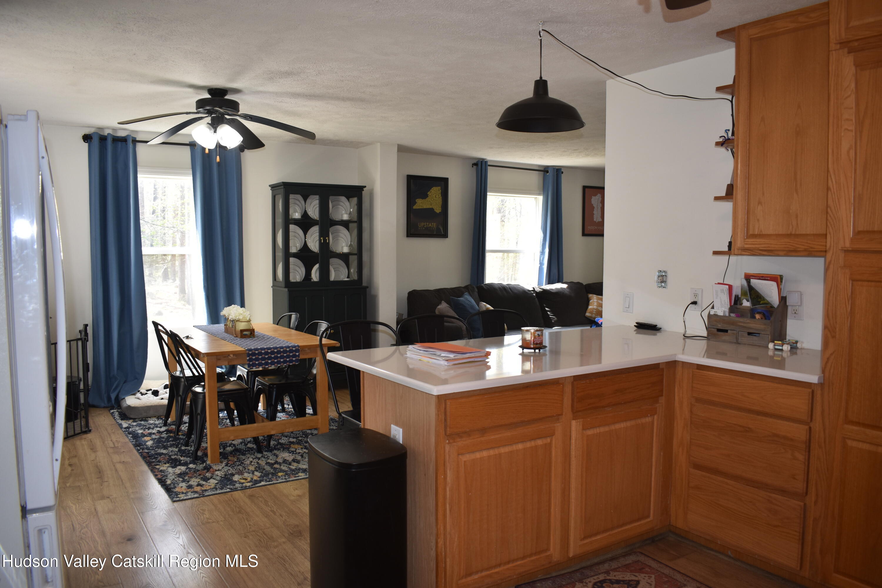 125 Hardenburgh Road Ulster Park, NY 12487 - Photo 14 of 45 a kitchen with a table chairs sink and cabinets