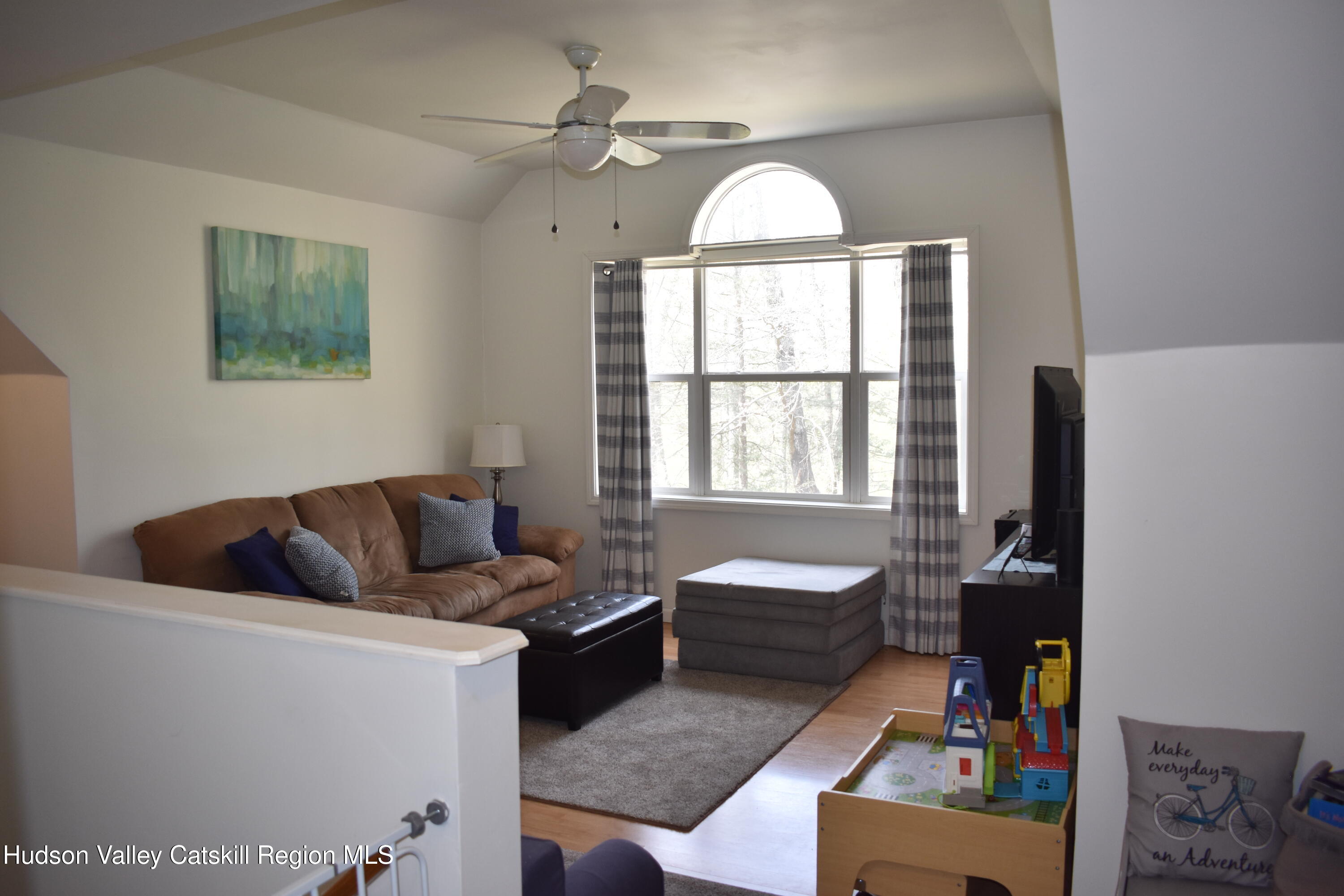 125 Hardenburgh Road Ulster Park, NY 12487 - Photo 25 of 45 a living room with furniture and a window
